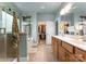 Bright bathroom features a separate shower, bathtub, and walk-in closet at 163 Sassafras Rd, Mooresville, NC 28115