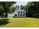 Two-story home with an attached two-car garage and a well-manicured front yard at 1636 Springwinds Dr, Rock Hill, SC 29730