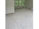 Unfinished living room featuring multiple windows letting in an abundance of natural light at 177 Mountain View Ln, Troy, NC 27371