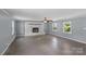 Spacious living room with fireplace and multiple windows providing natural light at 2000 Townsend Ave, Charlotte, NC 28205