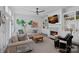 Cozy living room with fireplace, built-in shelves, comfortable seating, and natural light at 202 Caldwell Ln, Davidson, NC 28036