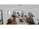 Versatile living area with a home office, media space, and comfortable seating at 202 Caldwell Ln, Davidson, NC 28036