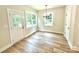 Cozy dining room with a stylish chandelier and a door to the backyard, perfect for entertaining at 203 Putnam St, Shelby, NC 28152