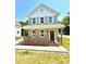 Charming two-story home with a cozy front porch, perfect for relaxing and enjoying the outdoors at 203 Putnam St, Shelby, NC 28152