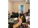 Messy bedroom filled with plastic storage containers, bags, boxes and disorganized personal items at 2056 Evergreen Dr, Newton, NC 28658