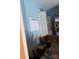 Cluttered bedroom with items scattered around a light blue wall at 2056 Evergreen Dr, Newton, NC 28658