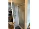Bathroom shower with glass doors and some clutter at 2056 Evergreen Dr, Newton, NC 28658