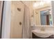 Bathroom featuring updated fixtures including rainfall shower head at 2115 Arnold Dr, Charlotte, NC 28205