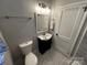 Bathroom featuring modern fixtures, and a decorative mirror at 2115 Arnold Dr, Charlotte, NC 28205