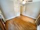 Bedroom featuring natural light, ceiling fan, and built-in closet at 2115 Arnold Dr, Charlotte, NC 28205