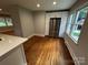 Eat-in kitchen area with stainless steel appliances and hardwood floors at 2115 Arnold Dr, Charlotte, NC 28205