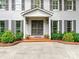 Inviting home featuring a stylish front door with decorative shrubbery at 2141 Halford Pl, Charlotte, NC 28211
