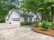 Two car attached garage with beautiful landscaping on a well maintained lot at 2141 Halford Pl, Charlotte, NC 28211