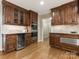 Spacious kitchen featuring wood cabinets, granite counters, and stainless steel appliances at 2141 Halford Pl, Charlotte, NC 28211