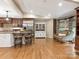 Open concept living room with breakfast bar and comfortable seating at 2141 Halford Pl, Charlotte, NC 28211