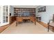 Spacious home office with grand wooden desk and built-in bookcase at 2141 Halford Pl, Charlotte, NC 28211