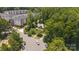 An aerial view showcases the home nestled within a lush neighborhood near apartments at 215 W Eastway Drive Dr, Charlotte, NC 28213
