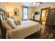 Bedroom features hardwood flooring, and ensuite bathroom at 215 W Eastway Drive Dr, Charlotte, NC 28213