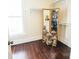 Walk-in closet with built-in shelving and hanging space, offering great storage solutions and hardwood floors at 215 W Eastway Drive Dr, Charlotte, NC 28213