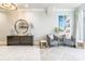 Stylish foyer with twin chairs, side tables, modern art, and contemporary decor, offering a welcoming atmosphere at 222 S Caldwell St # 2203, Charlotte, NC 28202