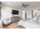 Light filled main bedroom boasts a large TV and sitting area at 222 S Caldwell St # 2203, Charlotte, NC 28202