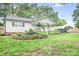 Charming single-story home with a welcoming front porch and landscaped garden at 2279 Cedar Oak Cir, Gastonia, NC 28052