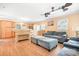 Cozy living area with hardwood floors, natural light, and open access to the kitchen at 2279 Cedar Oak Cir, Gastonia, NC 28052