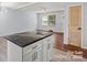 Bright living area with hardwood floors, an island, and neutral decor, perfect for entertaining and relaxation at 2515 Danforth Ln, Charlotte, NC 28208