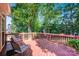 Spacious back deck offering plenty of room for outdoor seating and entertaining with a view of the yard at 2620 Yarrow Rd, Charlotte, NC 28213