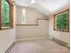 Cozy bedroom with carpeted flooring, natural light, and neutral paint at 3310 Windbluff Dr, Charlotte, NC 28277