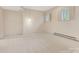 Bedroom with neutral walls, carpeted flooring, and a window with shutter style coverings at 3310 Windbluff Dr, Charlotte, NC 28277