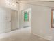 Bright bedroom with carpeting, a window, and closet at 3310 Windbluff Dr, Charlotte, NC 28277