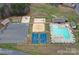 Aerial view of community amenities, including pool, bathhouse, sports courts, and playground at 333 Mount View Ln # 266 B, New London, NC 28127