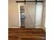 Stylish barn door leading to another room, adding character to the living space and maximizing functionality at 333 Mount View Ln # 266 B, New London, NC 28127