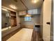 Bedroom with mirrored closet and built-in drawers at 333 Mount View Ln # 266 B, New London, NC 28127