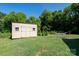 Spacious backyard featuring a charming storage shed and relaxing hammock, perfect for outdoor leisure at 360 Sexton St, Kannapolis, NC 28081