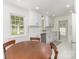 Bright kitchen boasts new cabinets, stainless steel appliances, and white quartz countertops at 3969 Sheffield Dr, Charlotte, NC 28205