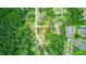 An aerial view of a neighborhood with mature trees and well-maintained homes at 407 Cummings St, Rock Hill, SC 29730