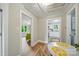 Hallway with wood-look floors, and doorways leading to different rooms at 407 Cummings St, Rock Hill, SC 29730