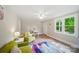 Inviting living room featuring bright furniture, lots of natural light, and neutral walls at 407 Cummings St, Rock Hill, SC 29730