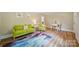 Bright and inviting living room featuring hardwood floors, comfortable seating and plenty of natural light at 407 Cummings St, Rock Hill, SC 29730