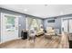 Cozy living room features wood floors, a large window with natural light, and comfortable seating at 411 Belvedere Cir, Kings Mountain, NC 28086