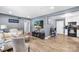 Open concept living area leading to the kitchen, complete with wood floors and comfortable seating at 411 Belvedere Cir, Kings Mountain, NC 28086