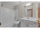Bathroom featuring a shower-tub combo, toilet, and vanity with sink at 4444 Steepleton Way, Charlotte, NC 28215