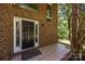 Close-up of the front door with sidelights on a brick home at 4444 Steepleton Way, Charlotte, NC 28215