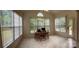 Bright dining area with large windows and backyard views, ideal for a home office or casual meals at 5009 Brook Valley Run, Monroe, NC 28110