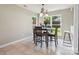 Bright dining area with a view of the backyard, perfect for entertaining and everyday meals at 5701 Silver Eagle Dr, Charlotte, NC 28214