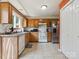 Bright kitchen featuring a full appliance package, tile flooring and ample cabinet and counter space at 5701 Silver Eagle Dr, Charlotte, NC 28214