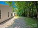 This view shows the large sliding glass door that allows access to the beautiful backyard at 5717 Fairchase Ave, Charlotte, NC 28269