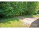 Enjoy easy access to this spacious backyard through a sliding glass door at 5717 Fairchase Ave, Charlotte, NC 28269